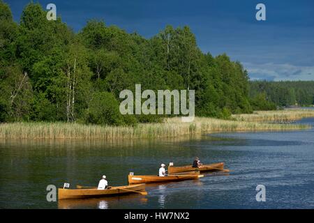 Finland, province of oriental Finland, Sulkava, Wooden canoes on a lake on the channel of Alanne Stock Photo