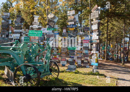 WATSON LAKE, CANADA- SEPTEMBER 13, 2010: Sign forest decorated by travelers on the Alaska Highway. Stock Photo
