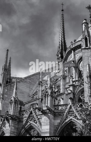 PARIS, FRANCE- SEPTEMBER 29, 2016: Flying buttresses and spries at Notre Dame Cathedral. Stock Photo