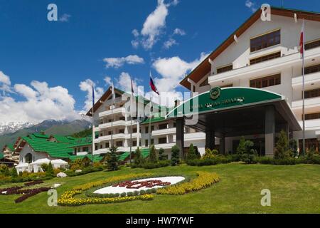 Russia, Caucasus Mountains, Sochi Area, Krasnaya Polyana, Gazprom Ski Resort, Grand Hotel Polyana, exterior, summer Stock Photo