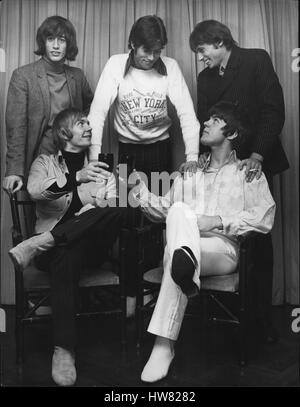 May 05, 1967 - The Bee Gees celebrate; The Bee Gees are in high spirits following the news that the two Australian members of the group, Vince Malouney, and Colin Petersen, are after all allowed to stay in Britain. Vince and Colin who came here almost a year ago to the day were told that they must quit Britain by November 30 because the Home Office were refusing to extend their portraits beyond that date. But maybe someone int he Home Office is a Bee Gee fan because news came last night that the boys were to be allowed to stay in Britain without further restrictions. This is lucky for all the Stock Photo