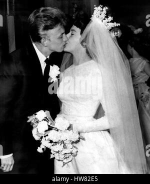 Jun. 06, 1960 - Tommy Steele weds in Soho. Signing the register: Huge crowds attended the wedding this afternoon at St. Patrick's Church, Soho of 'rock' singer Tommy Steele to Miss Ann Donoghue. Photo shows The Bride and bridegroom signing the register after their wedding this afternoon. (Credit Image: © Keystone Press Agency/Keystone USA via ZUMAPRESS.com) Stock Photo