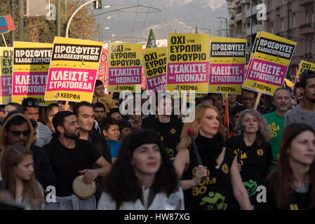 Athens, Greece. 18th Msrch, 2017. Refugees hold placards and shout slogans against closed borders and the EU-Turkey deal leaving them stranded in Greece. Leftist, anti-racist and human rights organizations staged a rally on the occasion of the European Action Week against Racism and the International Day for the Elimination of Racial Discrimination to demonstrate against racism, fascism and EU’s migration policies. © Nikolas Georgiou/Alamy Live News Stock Photo