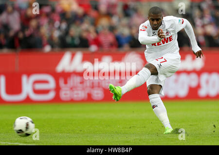 Cologne, Germany. 18th Mar, 2017. Anthony Modeste of 1. FC Koeln shoots and scores during the Bundesliga match between 1. FC Koeln and Hertha BSC in Cologne, Germany, on March 18, 2017. The team of 1. FC Koeln won 4-2. Credit: Ulrich Hufnagel/Xinhua/Alamy Live News Stock Photo