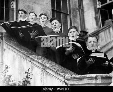 May 14, 1953 - Choirboys Rehearse For Coronation. Thirty-two boys are rehearsing the music for the coronation, at Addington Palace, Croydon. Twenty of the boys have been chosen for the Royal School of Music from amongst its 3,000 member choirs from all over the country, and the other twelve are choristers from six cathedrals. This is the first coronation, it is believed, at which boys from parish church and school choirs have been chosen to sing. Keystone Photo Shows:- (L to R): Dermot McConnell, of Belfast (St. Anne's Cathedral); Water Officer, of Belfast (St. Anne's Cathedral); David Harry G Stock Photo