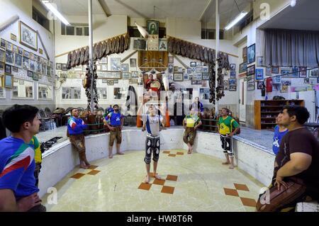 Iran, Isfahan Province, Isfahan, home of force (Zurkhaneh) where traditional Iranian national sport called Varzesh-e Pahlavani (Pahlevani and zoorkhaneh rituals) is practiced Stock Photo