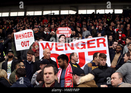 Fans hold up a Wenger Out banner in the stands during the Premier League match at The Hawthorns, West Bromwich. Stock Photo