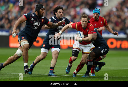 Wales' Jonathan Davies is tackled by France's Gael Fickou and Kevin Gourdon during the RBS 6 Nations match at the Stade de France, Paris. Stock Photo