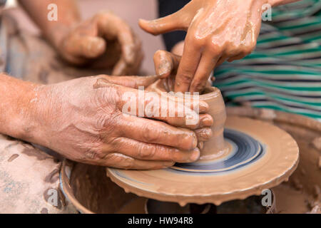 Pottery making, close up on hands Stock Photo