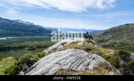 A Chilean gaucho on his horse, in Patagonia Stock Photo