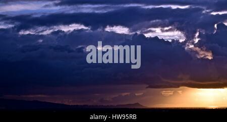 Stormy Diamondhead, in Hawaii on the island of Oahu as storm clouds approach. Stock Photo