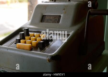 Vintage Calculator / Antique old mechanical adding machines. Stock Photo