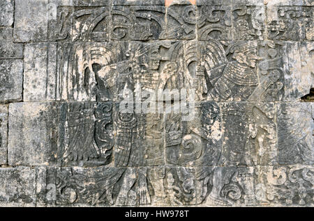 Bas-relief with human representations and symbols, ball court, historic Mayan city of Chichen Itza, Piste, Yucatan, Mexico Stock Photo