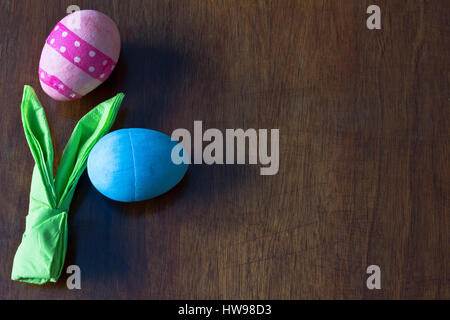Easter Eggs and napkin decorations on table at home Stock Photo