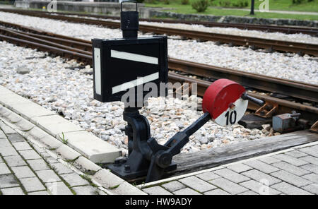 Blue and green railroad track switch stand Stock Photo - Alamy