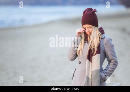 Portrait of a young blonde girl crying Stock Photo - Alamy