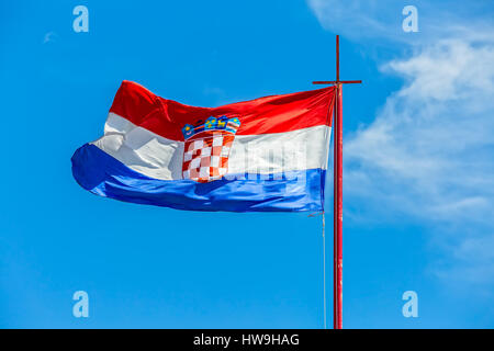 Croatian flag against blue sky Stock Photo