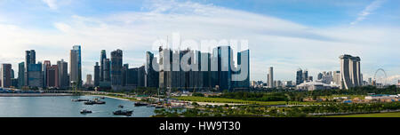 Horizontal panoramic (3 picture stitch) cityscape view of Singapore. Stock Photo