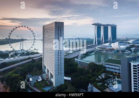 Singapore, Singapore Flyer, giant ferris wheel, elevated view, with Ritz Carlton and Marina Bay Sands Hotels, dawn Singapore, Singapore Flyer, giant ferris wheel, elevated view, with Ritz Carlton and Marina Bay Sands Hotels, dawn