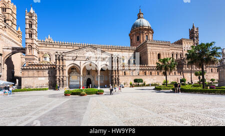 PALERMO, ITALY - JUNE 24, 2011: tourists on square and Palermo Cathedral. It is the cathedral church of Roman Catholic Archdiocese of Palermo dedicate Stock Photo