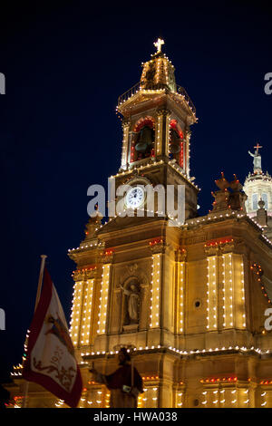 Church of the Sacred Heart of Jesus lit up in the evening to celebrate the festivale Stock Photo