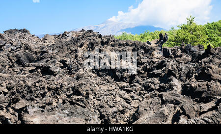 travel to Italy - petrified lava flow on slope of Etna volcano in ...