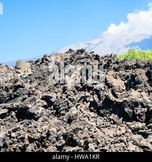 travel to Italy - hardened lava flow on slope of Etna volcano in Sicily ...