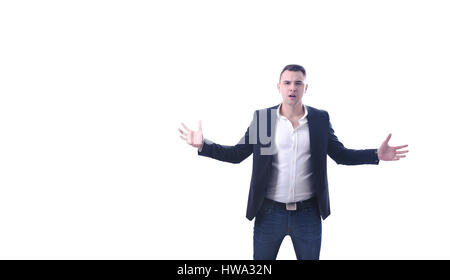 Young unsatisfied surprised businessman with arms open on white background Stock Photo