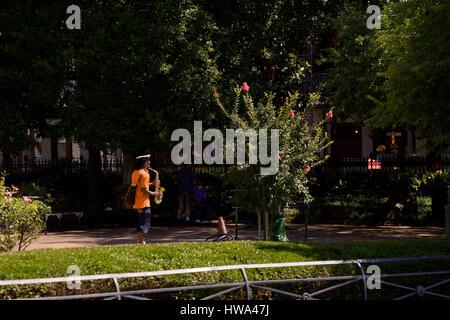 Saxaphonist playing in a park in New Orleans Stock Photo