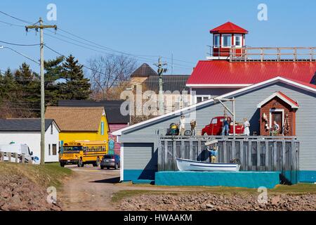 Canada, New Brunswick, Moncton, Shediac, Main Street, school bus, and decorated warehouse facade Stock Photo