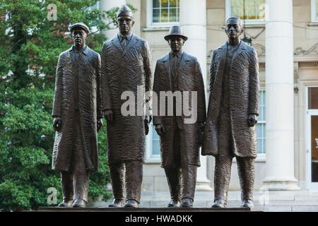 United States, North Carolina, Greensboro, statue of the Greensboro Four, students who staged a sit-in at a Woolworth's lunch counter in 1960 which le Stock Photo