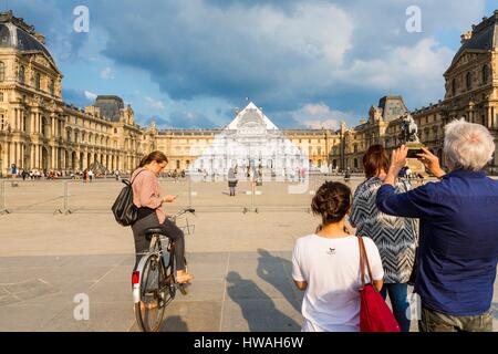 France, Paris, the Louvre Pyramid disappears for a month (may 25th to June 27th 2016) thanks to a photographic collage of French artist JR Stock Photo