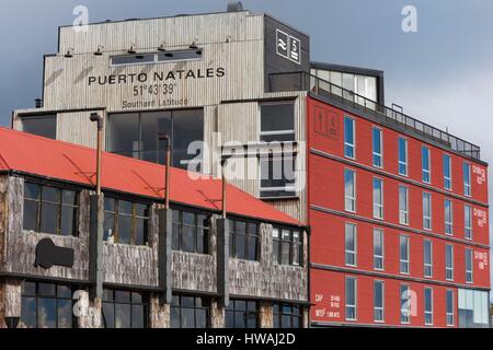 Chile, Magallanes Region, Puerto Natales, sign with town coordinates, Hotel Indigo Stock Photo