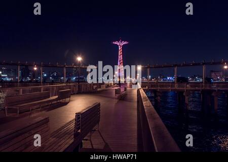 View on Coney Island Luna Park at night from Steeplechase Pier Stock Photo