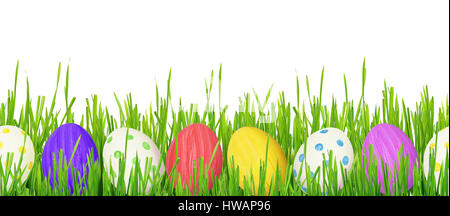 Easter eggs and grass border on white background. Seamless pattern. Stock Photo