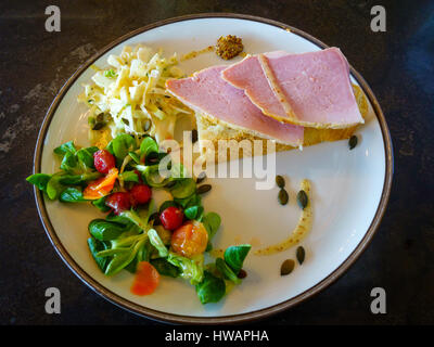 Café lunch Honey Roast  ham open sandwich with Pommery mustard salad and pickles Stock Photo