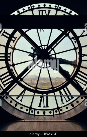 City view through Giant clock tower in Paris, France. Stock Photo