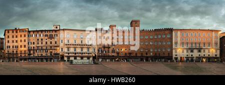 Old buildings in Piazza del Campo panorama view in Siena, Italy. Stock Photo