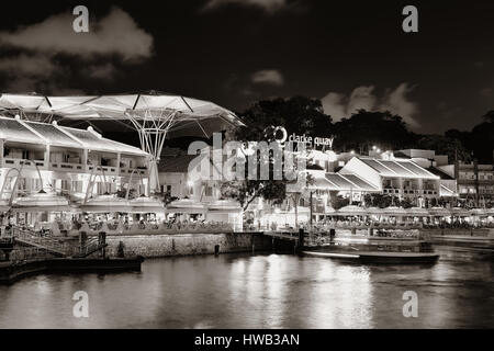 SINGAPORE - APR 5: Clarke Quay at night with street view and restaurant on April 5, 2013 in Singapore. As a historical riverside quay, it is now the h Stock Photo