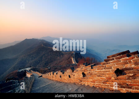 Great Wall in the morning with sunrise and colorful sky in Beijing, China. Stock Photo