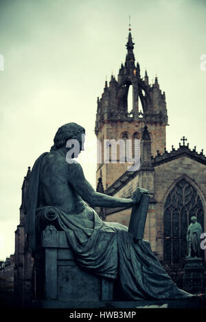 St Giles' Cathedral with David Hume statue as the famous landmark of Edinburgh. United Kingdom. Stock Photo