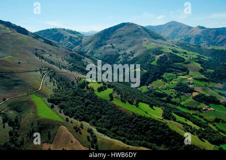 France, Pyrenees Atlantiques, the road in the French Pyrenees, between Saint Jean Pied de Port and Roncevaux (aerial view) Stock Photo