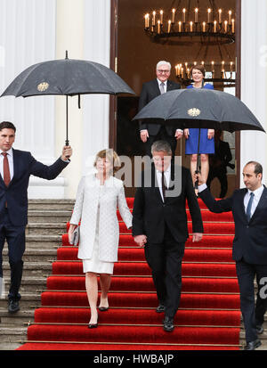 Berlin, Germany. 19th Mar, 2017. Germany's new President Frank-Walter Steinmeier (rear L) and his wife Elke Buedenbender (rear R) bid farewell to outgoing President Joachim Gauck (2nd R, front) and his domestic partner Daniela Schadt (2nd L, front) after a symbolic handover at the presidential residence of Bellevue Palace in Berlin, capital of Germany, on March 19, 2017. Credit: Shan Yuqi/Xinhua/Alamy Live News Stock Photo