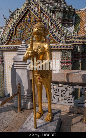 November 14, 2006 - Bangkok, Thailand - Golden statues of half-human, half-bird creatures known as the Kinnara and Kinnari, in the Grand Palace Complex in Bangkok. In Buddhist mythology, they watch over human welfare in times of trouble or danger. Thailand has become a favorite tourist destination. (Credit Image: © Arnold Drapkin via ZUMA Wire) Stock Photo