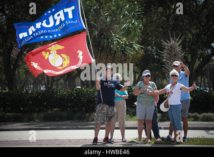 Florida, USA. 19th Mar, 2017. Trump supporters give the thumbs-up sign on Southern Boulevard prior to President Trump's departure from West Palm Beach Sunday, March 19, 2017 Credit: Bruce R. Bennett/The Palm Beach Post/ZUMA Wire/Alamy Live News Stock Photo
