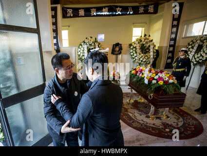 The funeral of Chinese student Zhang Yao in Tor Sapienza, Rome, Italy. The Chinese student was hit by a train while pursuing muggers. The body of the missing 21-year-old Chinese Fine Art student from Hohhot, Zhang Yao, was found on December 9th 2016 in a ditch, where it had apparently landed after being struck by the train. The train crew were unaware the of the accident. Her body was found in a bush next to the railway line that runs adjacent to the via Salvati traveller camp.  Featuring: Zhang Yao's Father Where: Rome, Italy When: 15 Feb 2017 Credit: IPA/WENN.com  **Only available for public Stock Photo