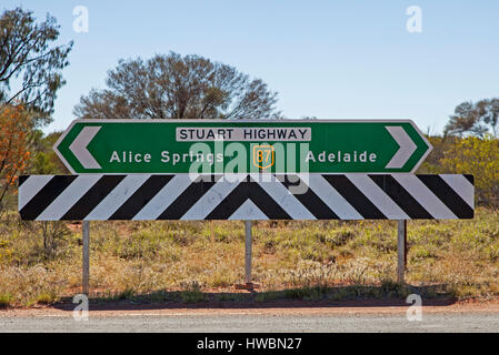 Direction Sign at the Lasseter Highway and Stuart Highway Crossing, Northern Territory, Australia Stock Photo