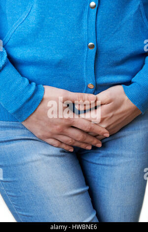 Closer Up Of Woman Suffering From Bladder Problem Stock Photo
