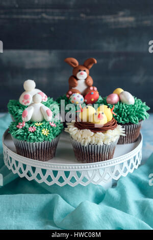 Served Easter cup cakes on the table,selective focus Stock Photo