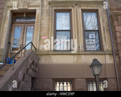 Anti-Trump signs in window of brownstone in Park Slope in Brooklyn, New York, 2017. Stock Photo